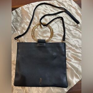 Elegant Black Leather Handbag with Gold Accents